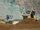 鹿島が“建機の自動化”をダム工事で本格導入、5時間の盛立作業に成功