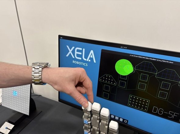 ��2��ŏЉ��XELA Robotics�̃f���B���Ђ�3D�G�o�Z���T�[�uuSkin�v�͍ő�1.5kg�A�𑜓x0.1g�ŗ͂��v���ł���m�N���b�N�Ŋg��n