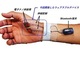 切り紙から着想した伸縮配線で、手のひらの筋活動の計測に成功