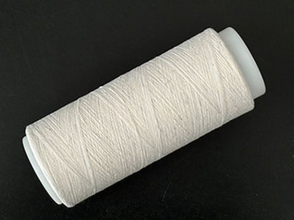 ドライファイバーテクノロジーで解繊した繊維を50％使用したコットンの糸（試作品）