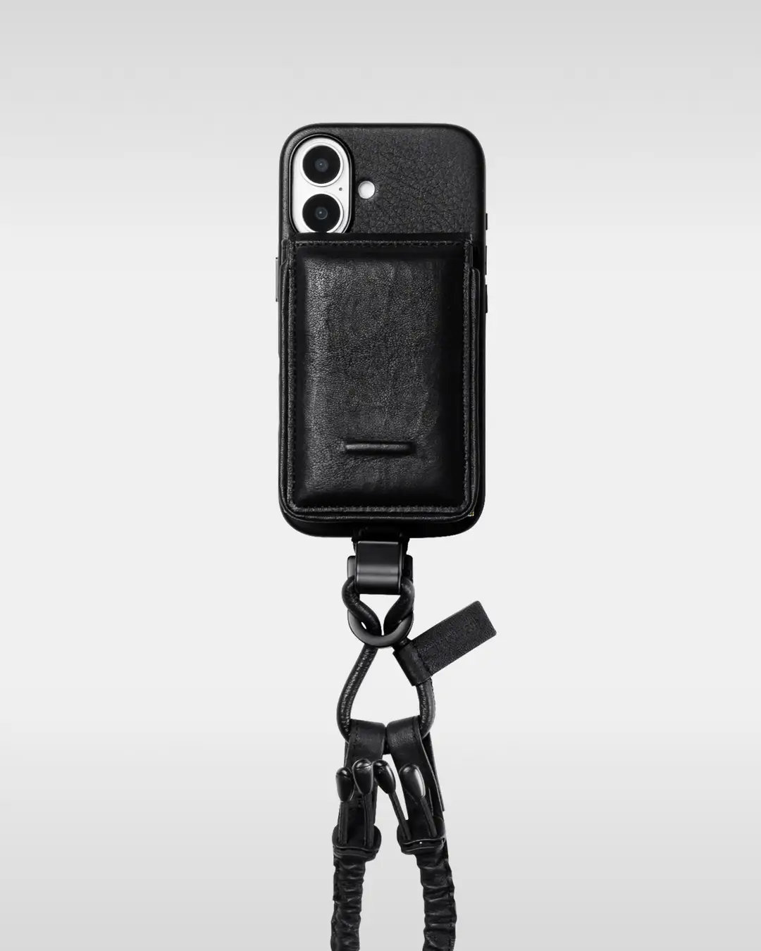 耐衝撃性レザーや落下防止具を備えたiPhoneポーチ 土屋鞄がファッションブランド「meanswhile」とのコラボで開発 - ITmedia ...