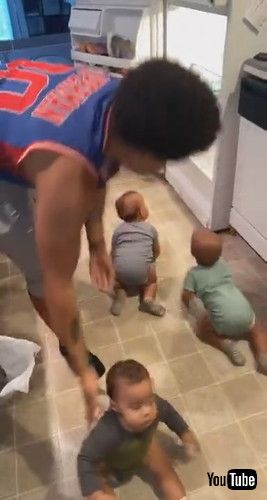 「Parent Struggles to Keep Triplets Out of Open Refrigerator as They Keep Crawling Into it - 1238905」