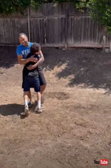 Little Boy Hugs His Father After Being Surprised With Personal Basketball Hoop - 1262365