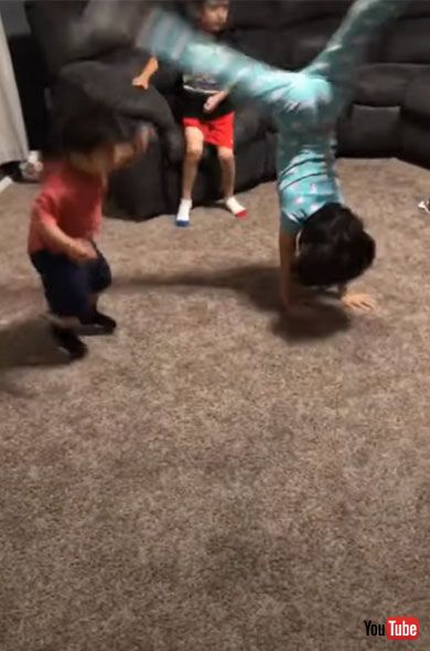 Kid Bangs His Head on the Floor While Imitating his Sister Trying to Frontflip - 1218689