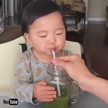 「Baby Girl Loves Drinking Green Celery Juice - 1042516」