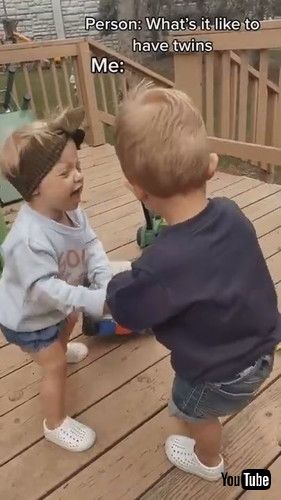uTwins Fight Over Toy Scooter - 1214979v