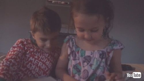 uKid Helps Toddler Sister to Read Bedtime Story - 1256668v
