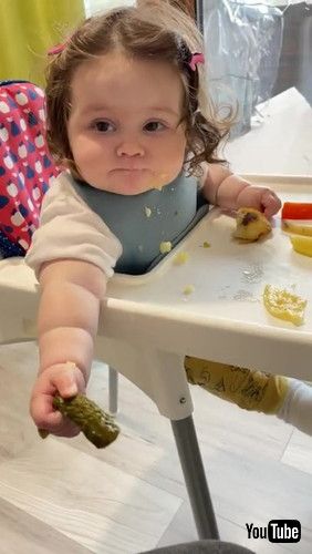 「Baby Throws Pickle on Floor Immediately After Being Told Not to - 1279608」