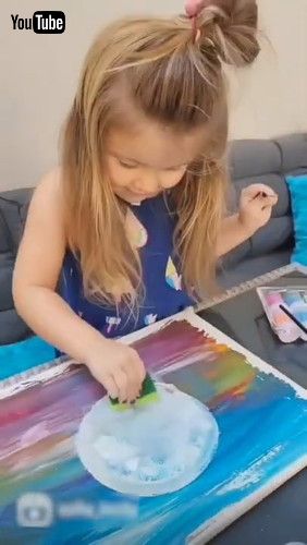 uLittle Girl Creates Beautiful Artwork Using Oil Paint - 1290933v