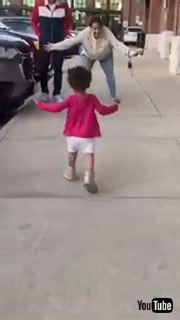 uLittle Girl Ignores Mom Waiting To Hug Her And Proceeds Towards Her Grandpa - 1335367v
