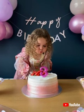 Little Girl Surprised by Stubborn Birthday Candle || ViralHog