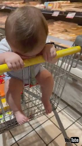 uBaby Keeps His Head Down in Supermarket || ViralHogv