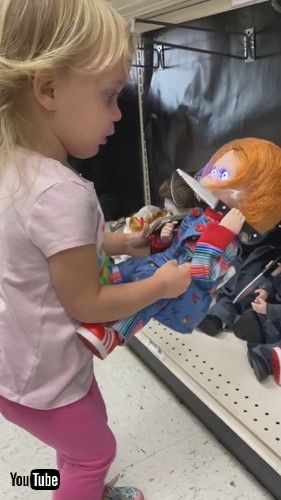 uSweet Girl Gently Puts Back Scary Doll After Getting Startled By it - 1372894v