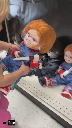 uSweet Girl Gently Puts Back Scary Doll After Getting Startled By it - 1372894v