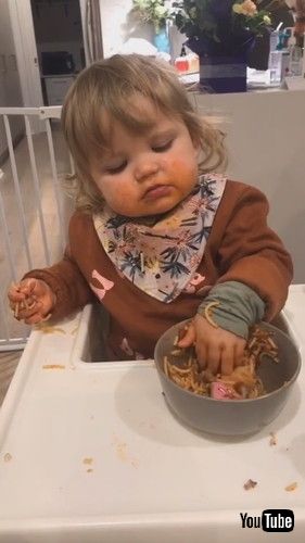 「Baby Makes Mess While Eating Spaghetti - 1382772」