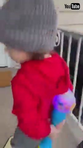 uLittle Kid Tries to Sneak in Toy Behind His Back by Lying to His Mother - 1385173v