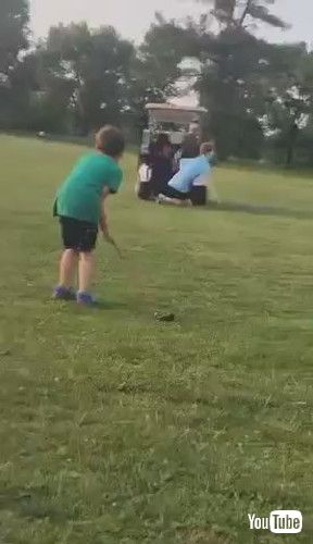 uLittle Boy Ends Up Mistakenly Hitting Uncle While Practicing Golf - 1424804v