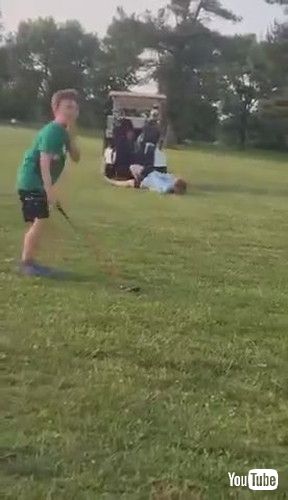 uLittle Boy Ends Up Mistakenly Hitting Uncle While Practicing Golf - 1424804v