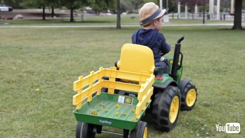 uKid Collects Dandelions in His Toy Truck From Park - 1432946v
